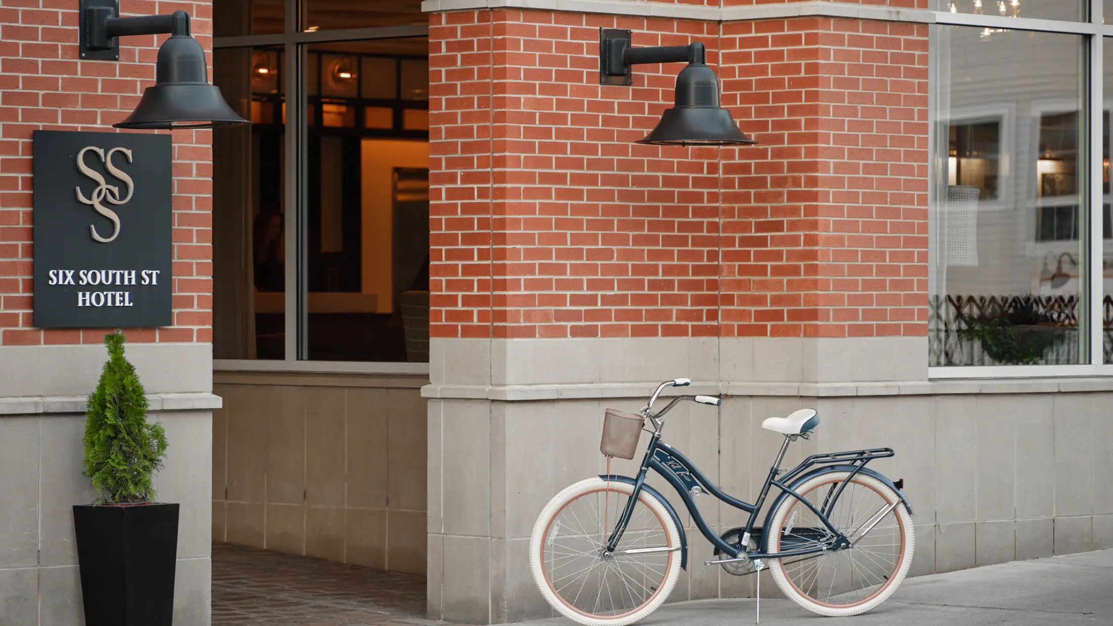 Bicycle near front door of Six South St Hotel, Hanover, New Hampshire.